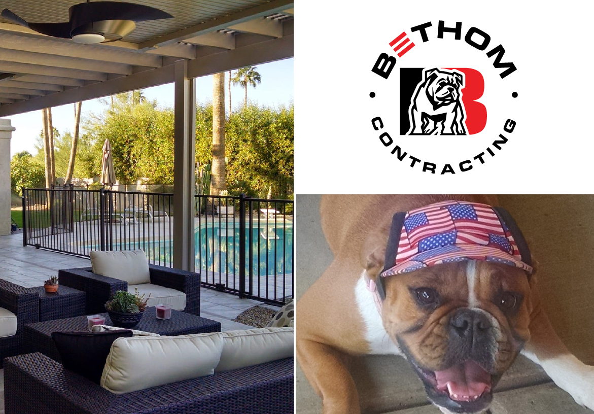 A finished luxury patio project by Bethom Contracting, displayed next to the company's real-life bulldog mascot wearing an American flag hat.