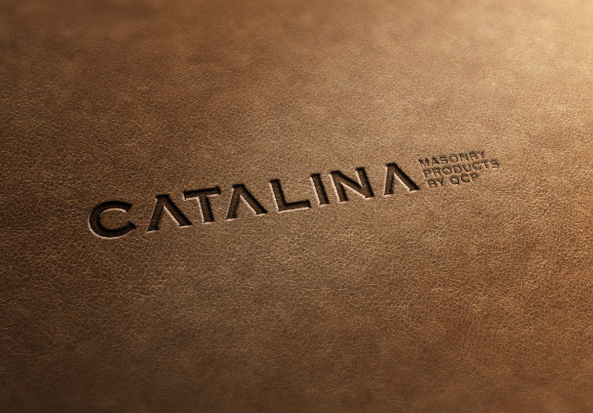 Close-up of the Catalina Masonry Products logo embossed into a premium leather texture, symbolizing durability and high-quality materials.