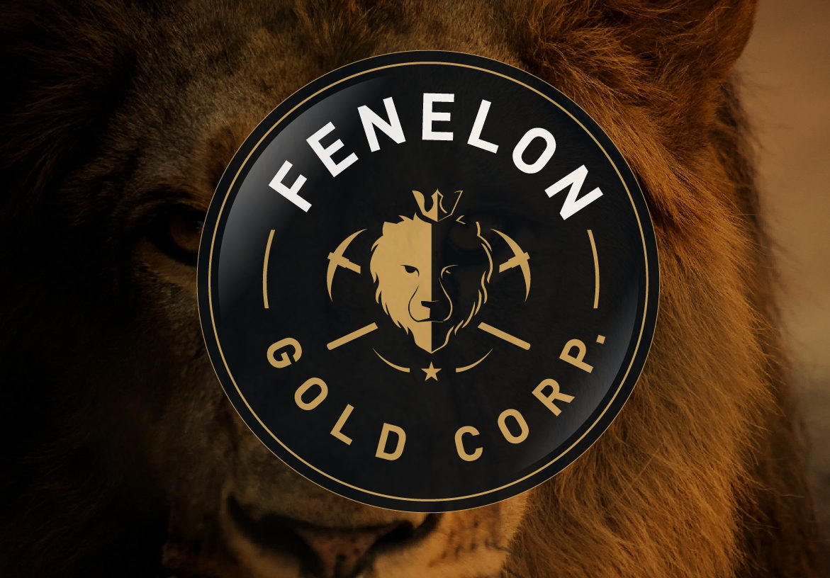 3D glossy gold badge design of the Fenelon Gold Corp logo, highlighting the premium finish and crossed pickaxes symbol.