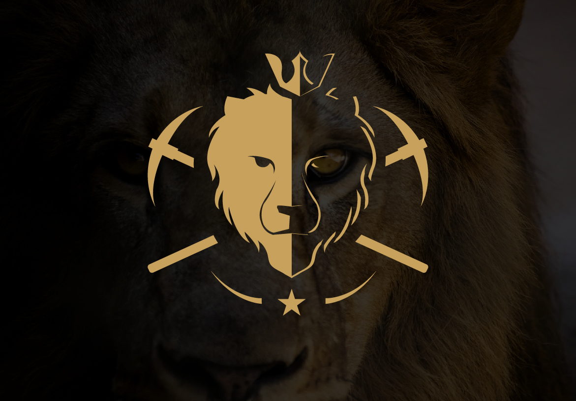 Gold lion head logo for Fenelon Gold Corp featuring crossed mining picks, overlaying a dramatic close-up of a lion's face in shadow.