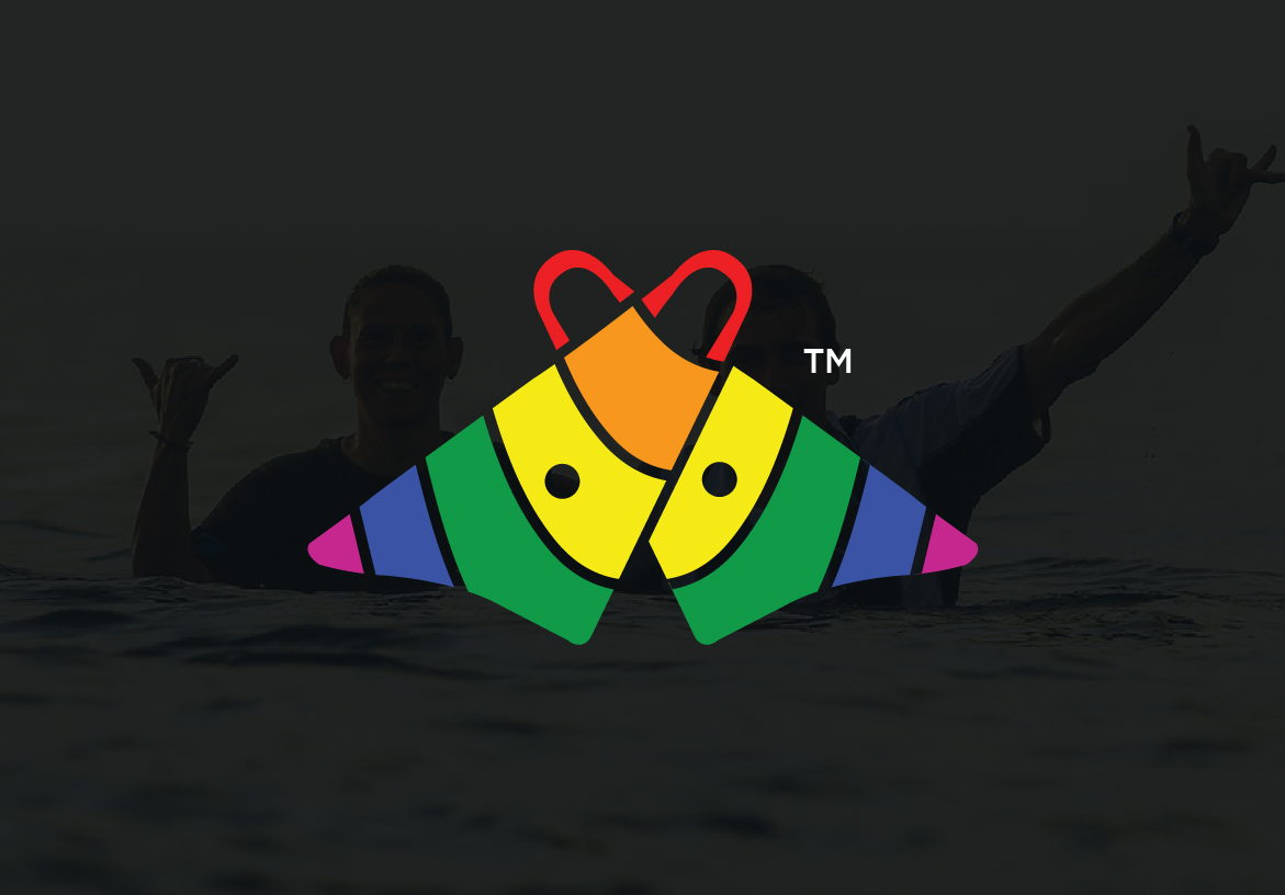 Creative variation of the Paddle Out logo where two rainbow fins mirror each other to form a heart shape, symbolizing love for the ocean.