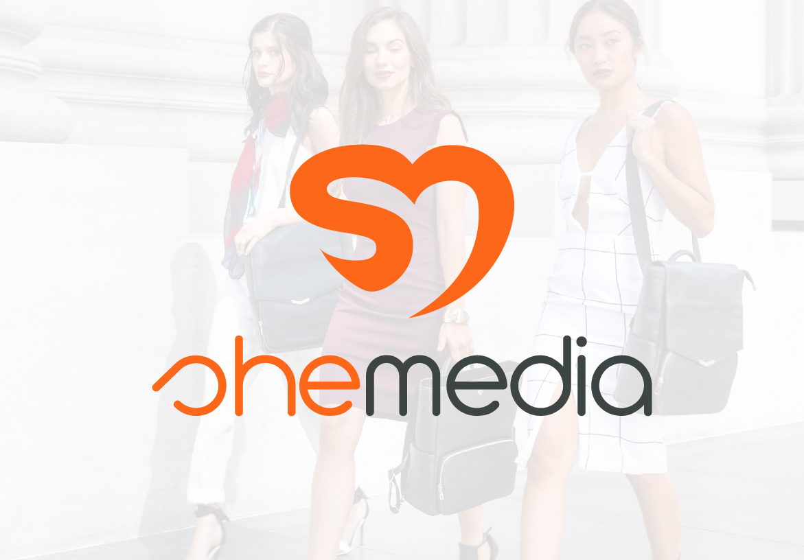 Official logo design for SheMedia, a women's lifestyle company, featuring a stylized orange heart icon and modern lowercase typography.
