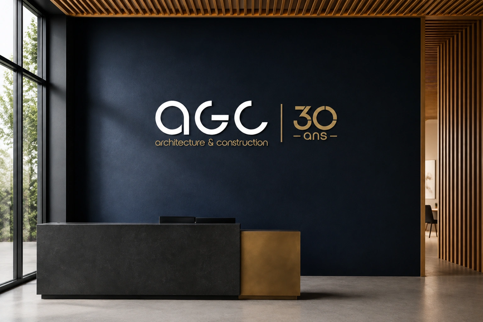 Contemporary timber reception with dimensional AGC and gold 30th anniversary signage on a navy wall