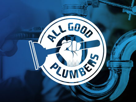All Good Plumbers logo featuring a strong fist holding a pipe wrench, overlaid on a blue-tinted background of a plumber repairing a sink.