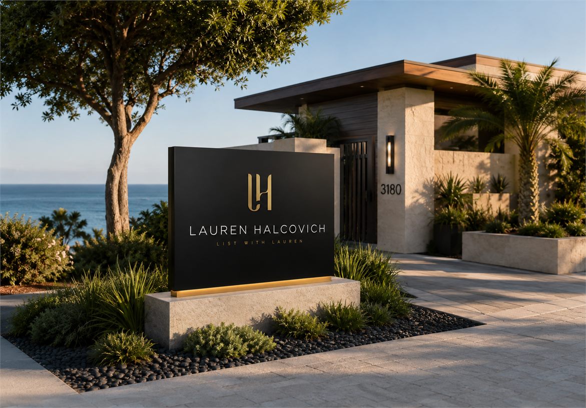 Lauren Halcovich coastal property monument sign with gold LH monogram outside a luxury home