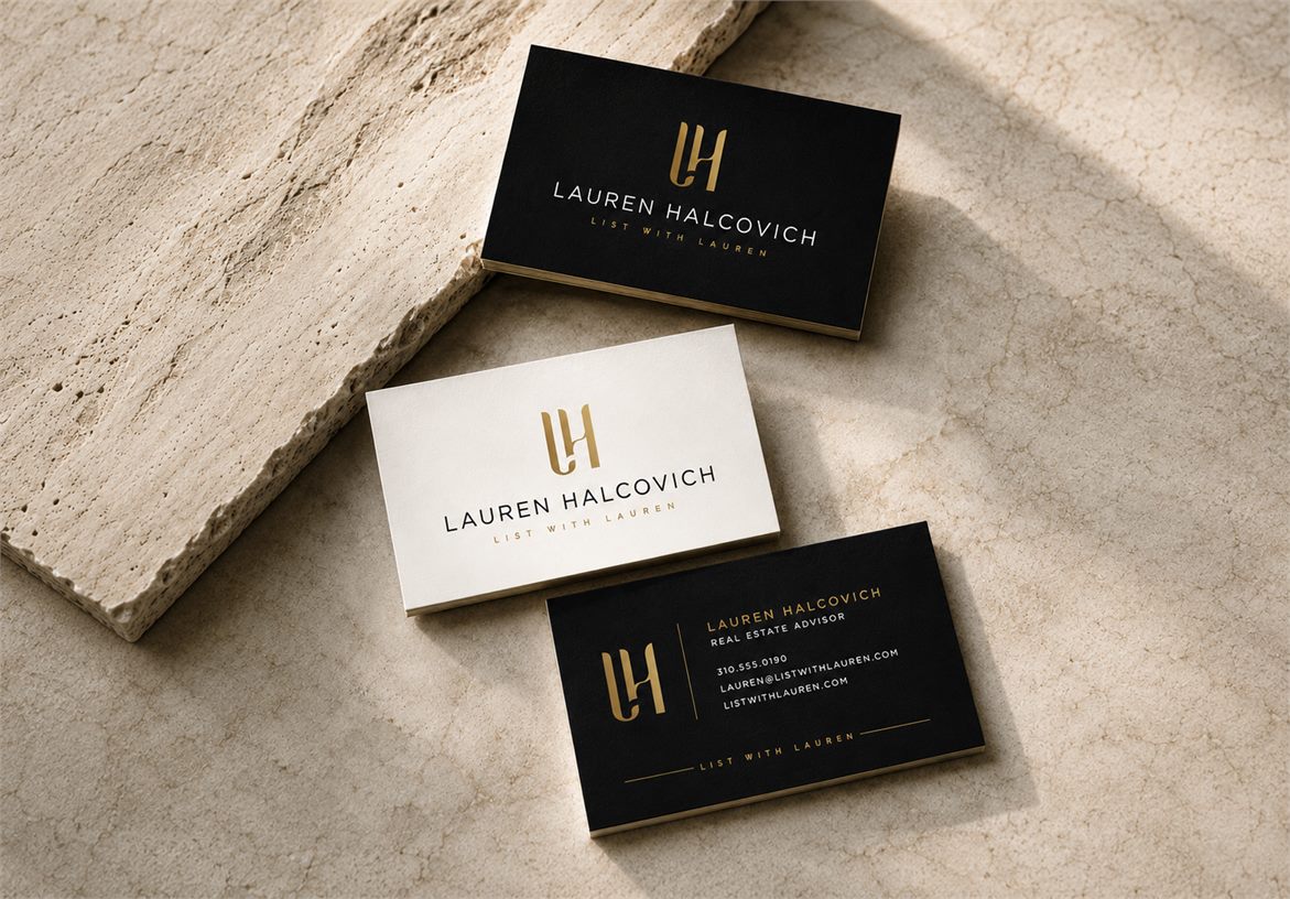 Premium Lauren Halcovich business cards showing the black and white real estate brand palette