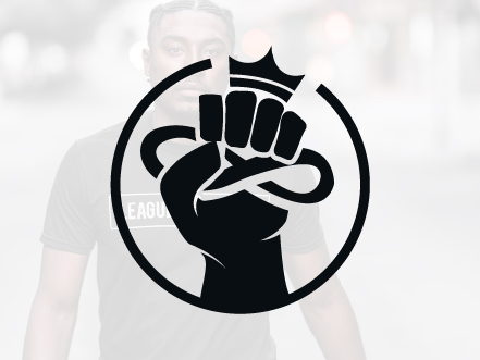 Leagul Hustle logo symbol featuring a raised fist holding an infinity loop topped with a crown, overlaid on a model wearing the brand's urban apparel.
