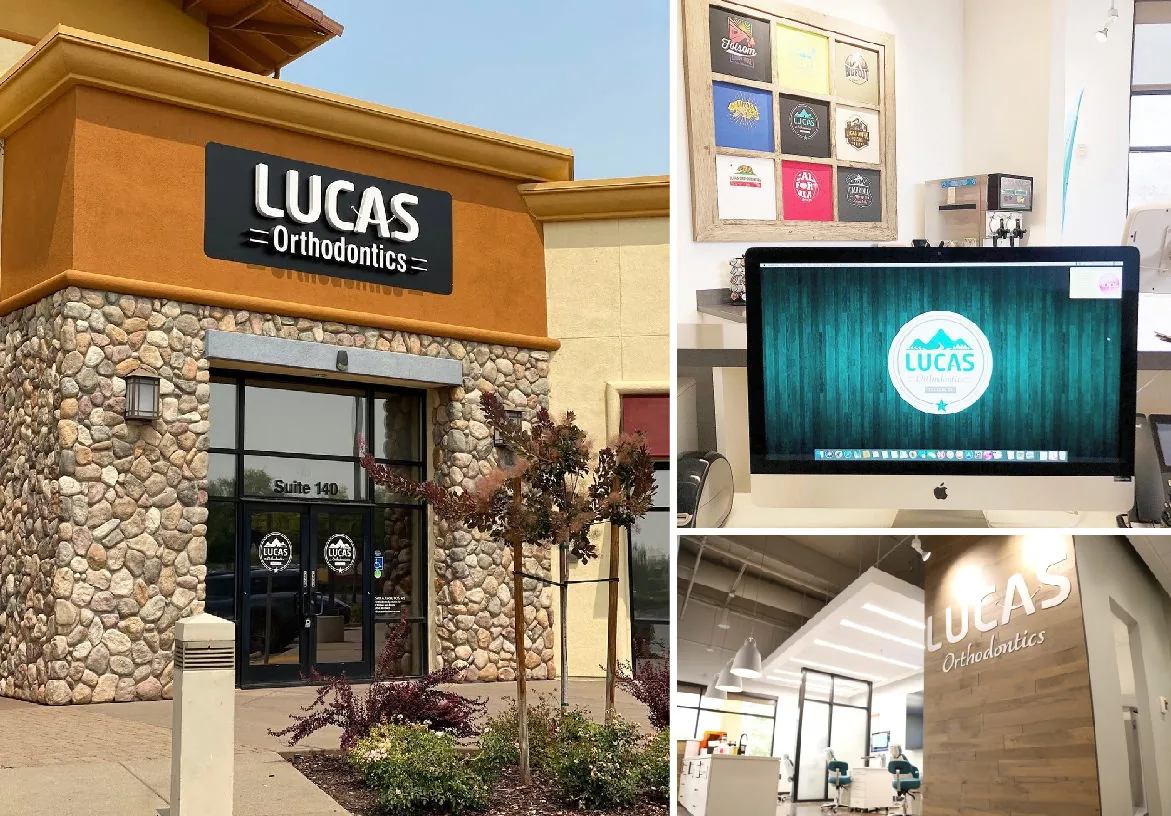 Modern reception area of Lucas Orthodontics featuring a rustic wood panel wall with 3D logo signage