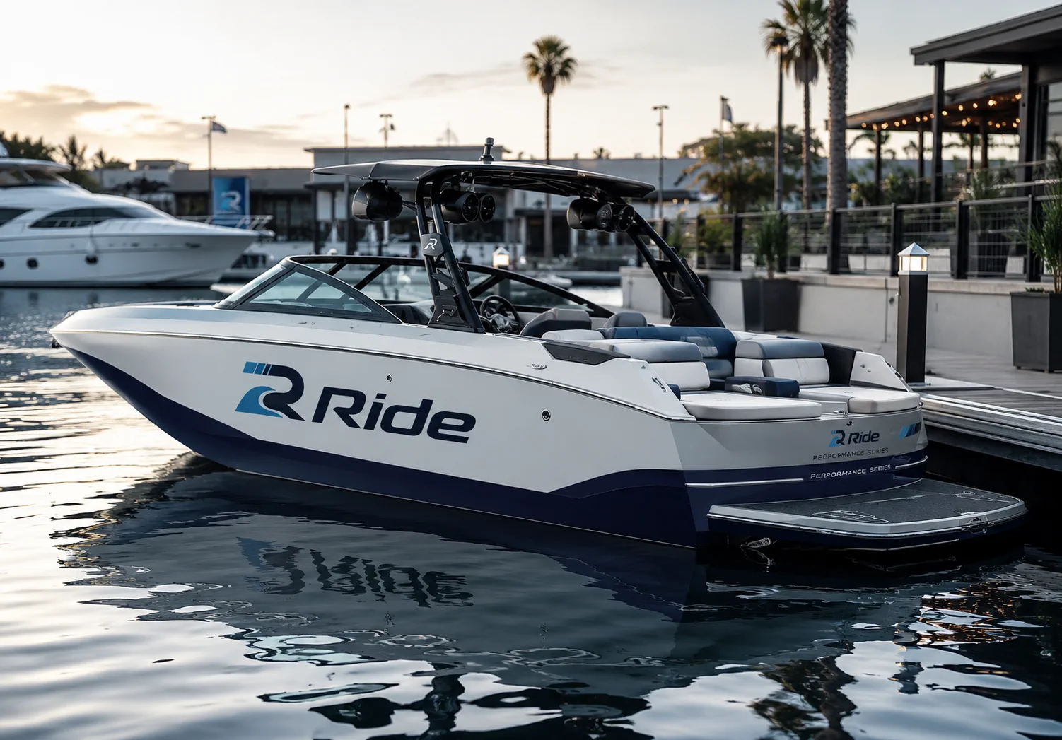 Ride logo applied to a white boat docked in a marina