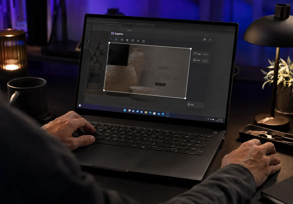 Designer using Snapline to select and capture a region on a Windows laptop