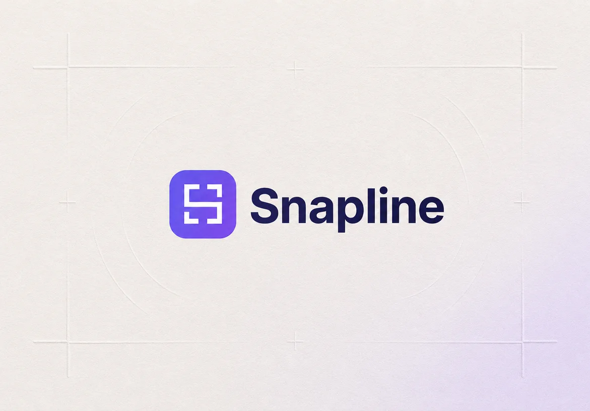 Snapline logo printed on a softly textured white editorial surface with precision guide marks