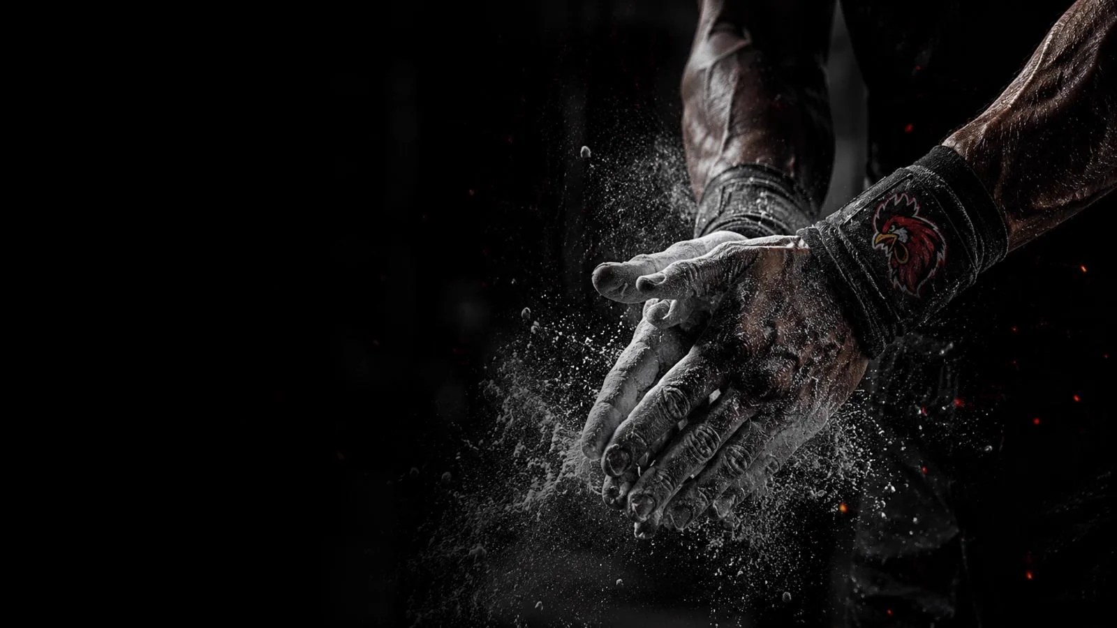 Chalked athlete hands with Wake Up Sports rooster detail on apparel