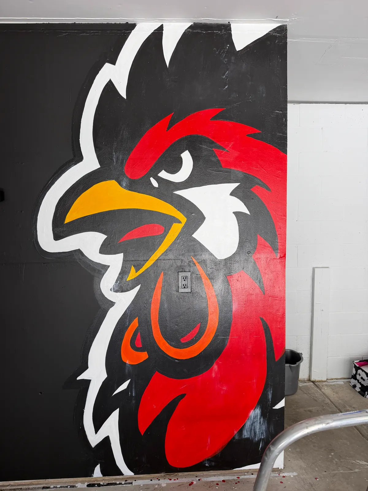 Close detail of the Wake Up Sports rooster mural with cleaner fill areas and bold white outline
