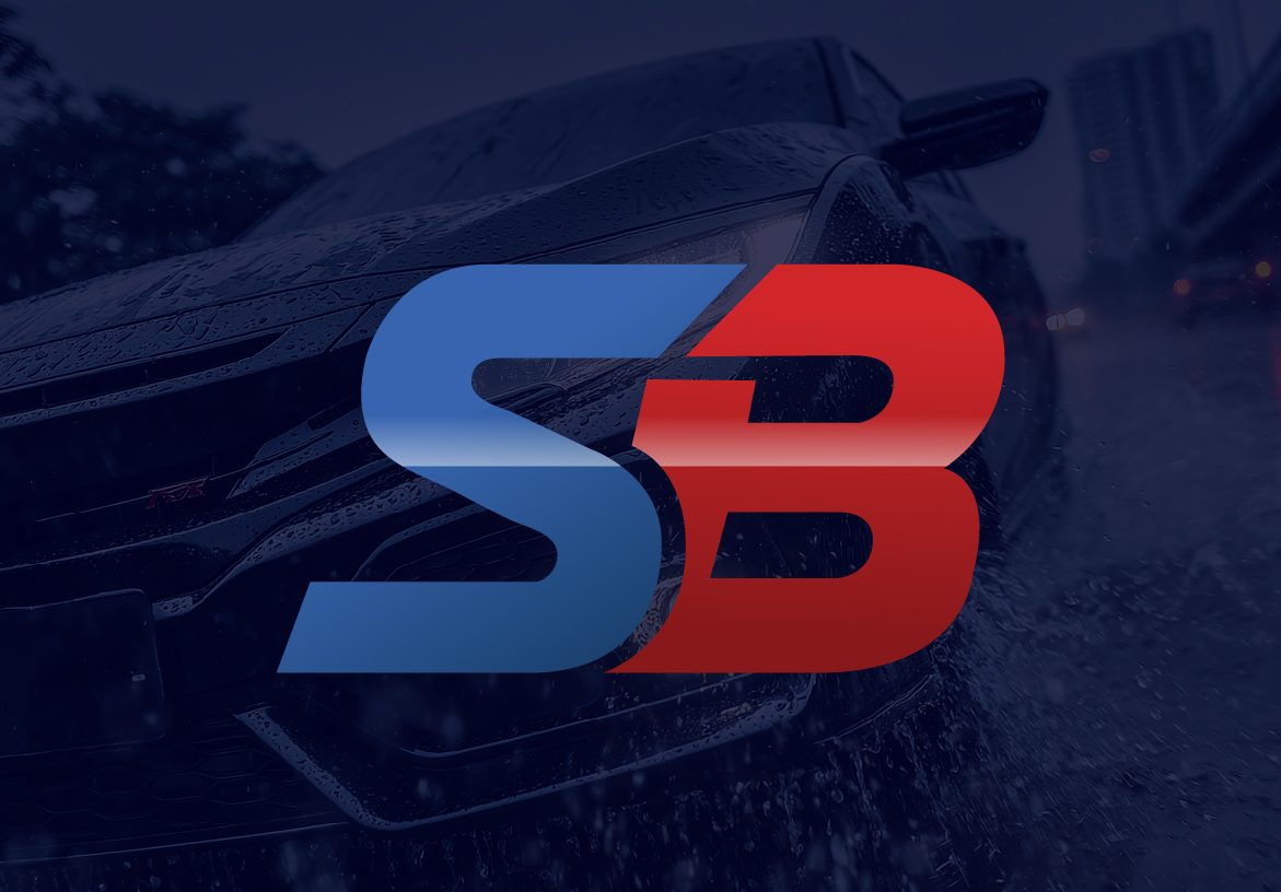 Sam Boswell Automotive Group SB monogram logo on a dark automotive background