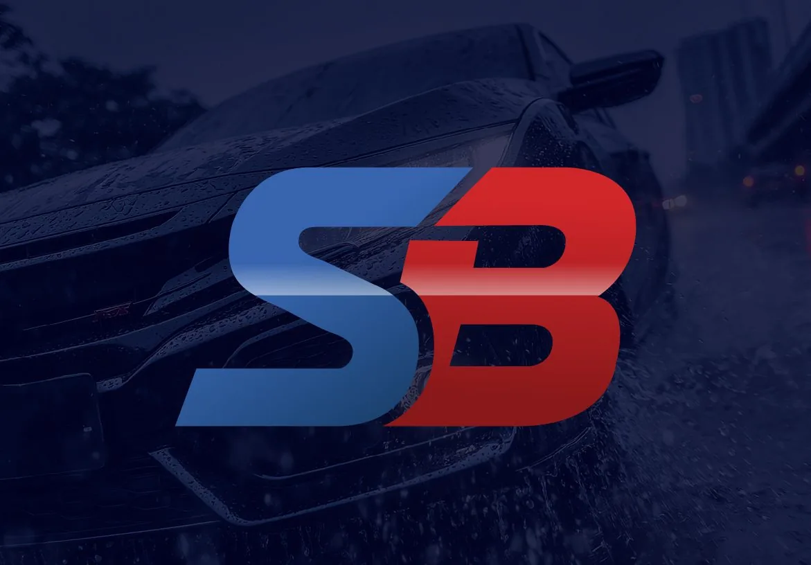 Sam Boswell Automotive Group SB monogram logo on a dark automotive background